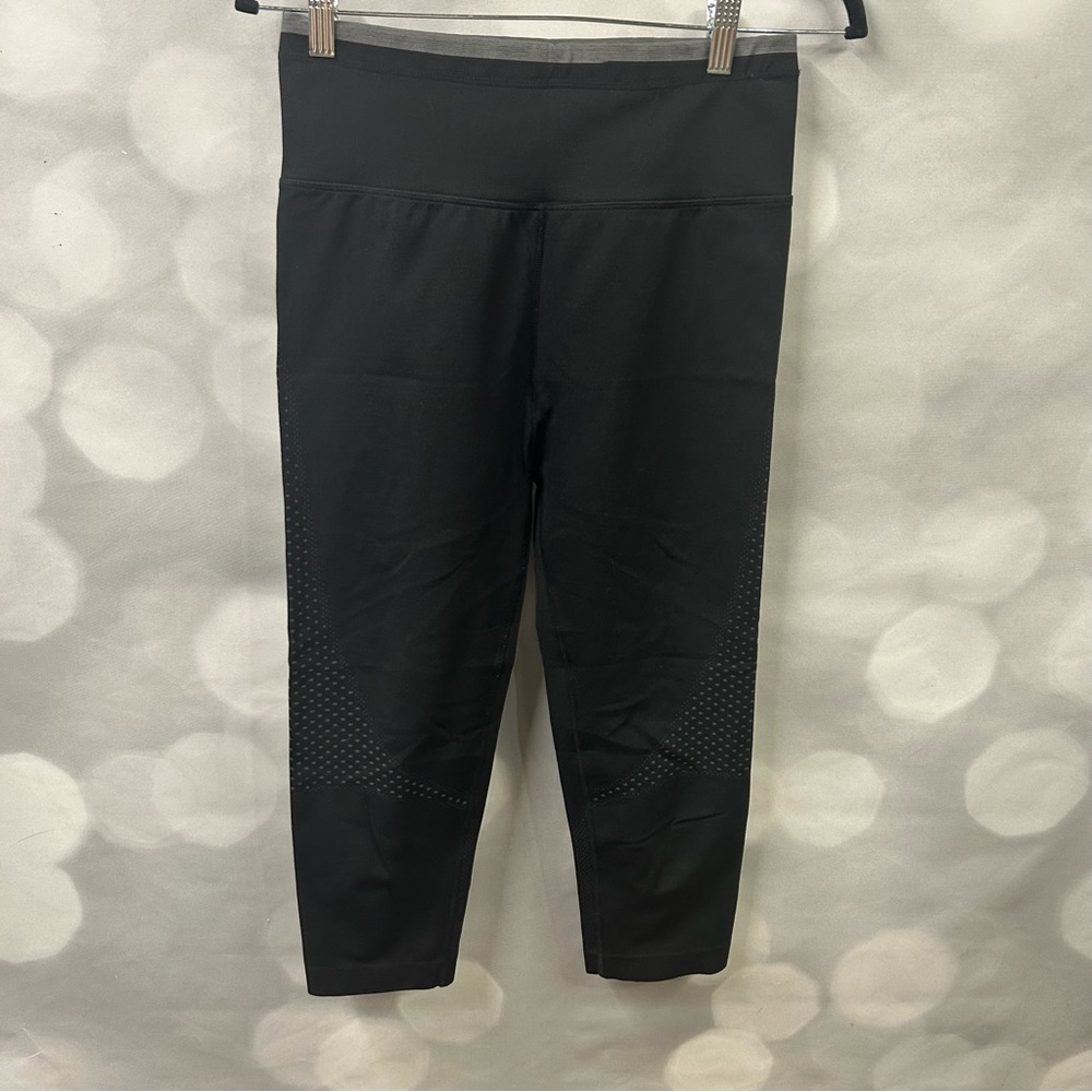 Be Inspired black leggings tights with some aeration on leg (medium)